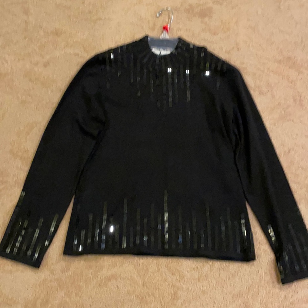 Ladies’ evening sweater.